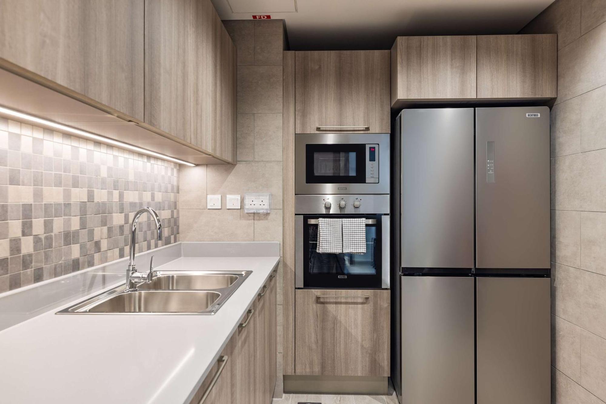 Отель Doubletree By Hilton Doha Downtown Экстерьер фото A modern kitchen