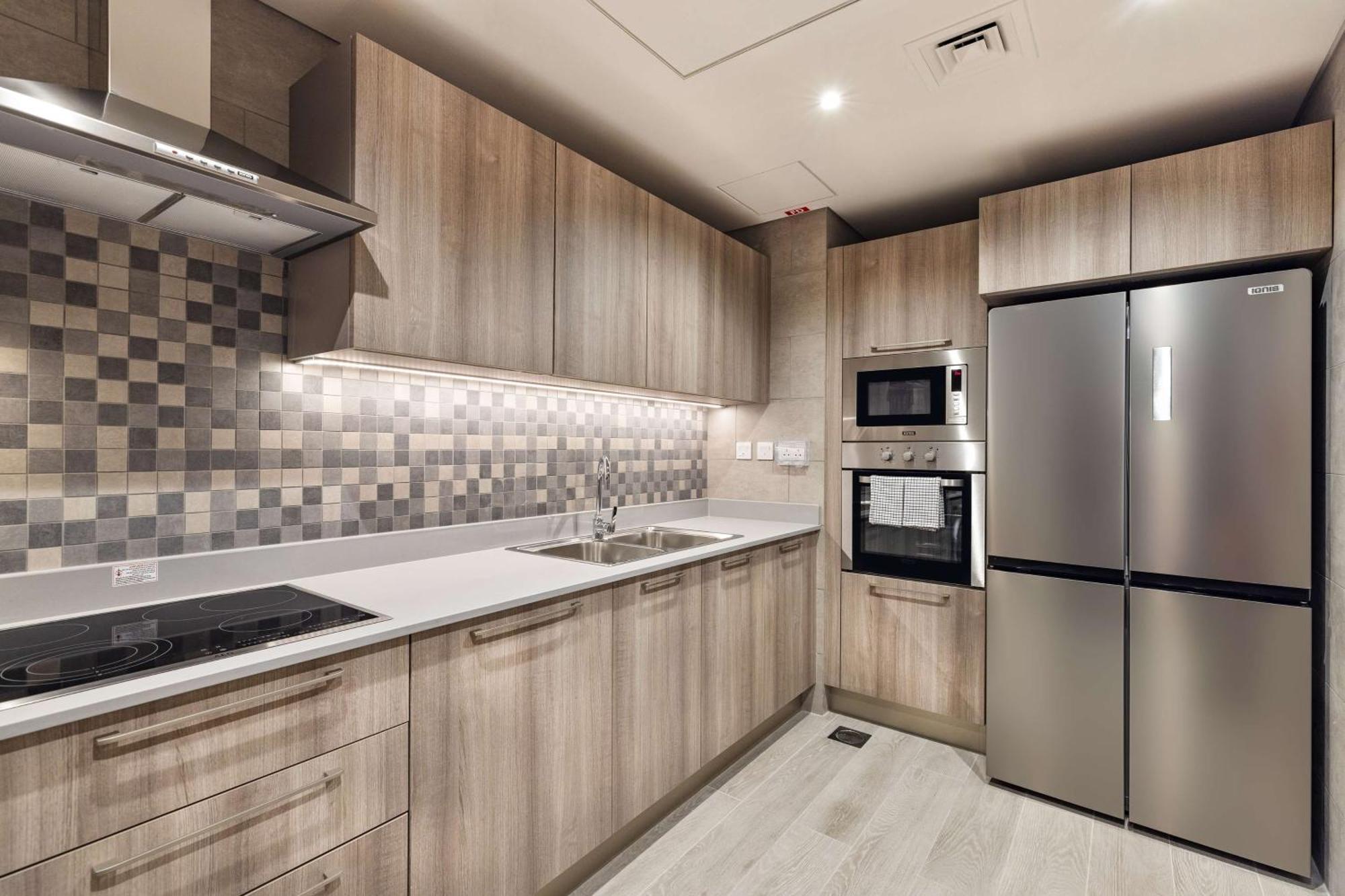 Отель Doubletree By Hilton Doha Downtown Экстерьер фото A modern kitchen