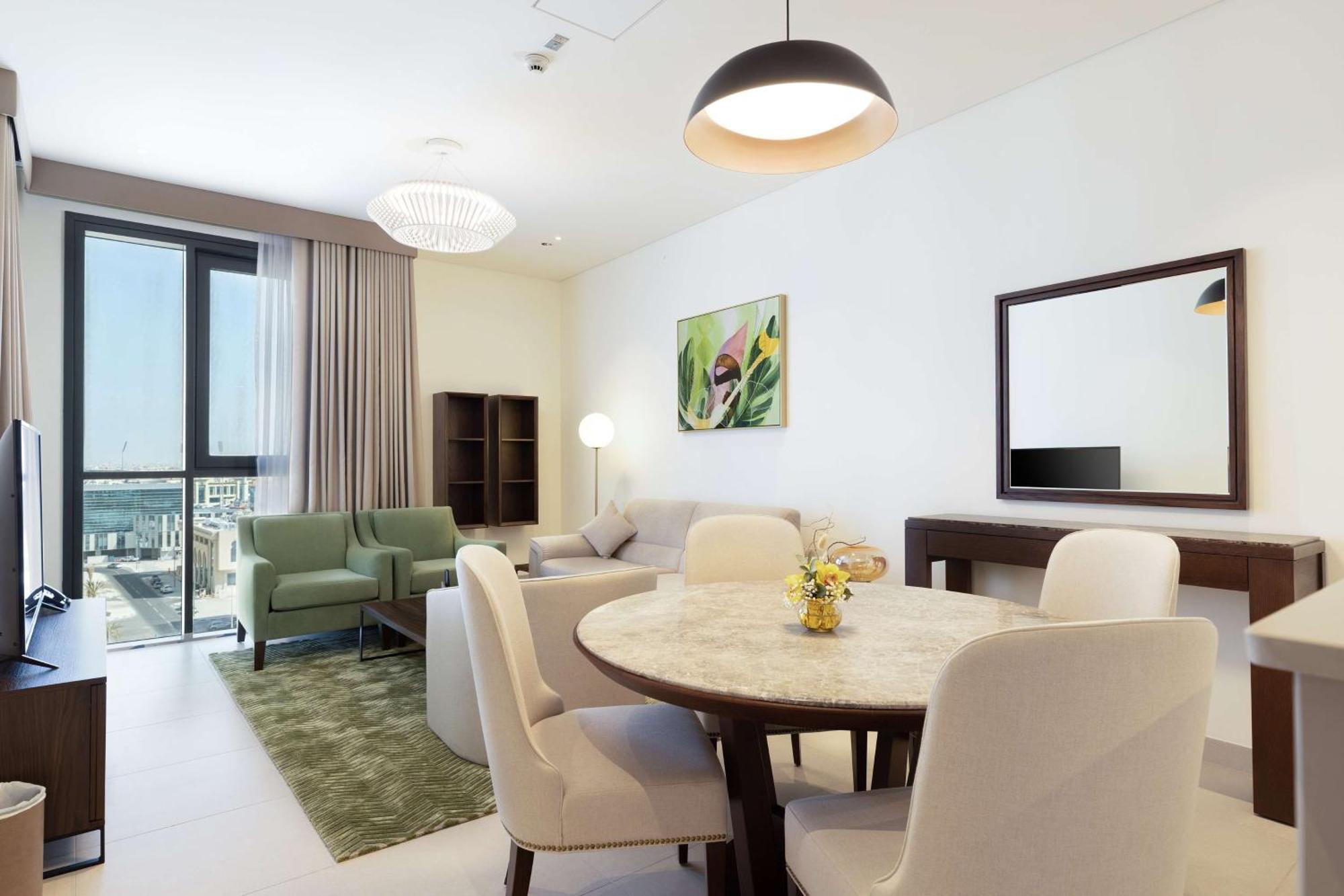 Отель Doubletree By Hilton Doha Downtown Экстерьер фото A living room in a typical apartment
